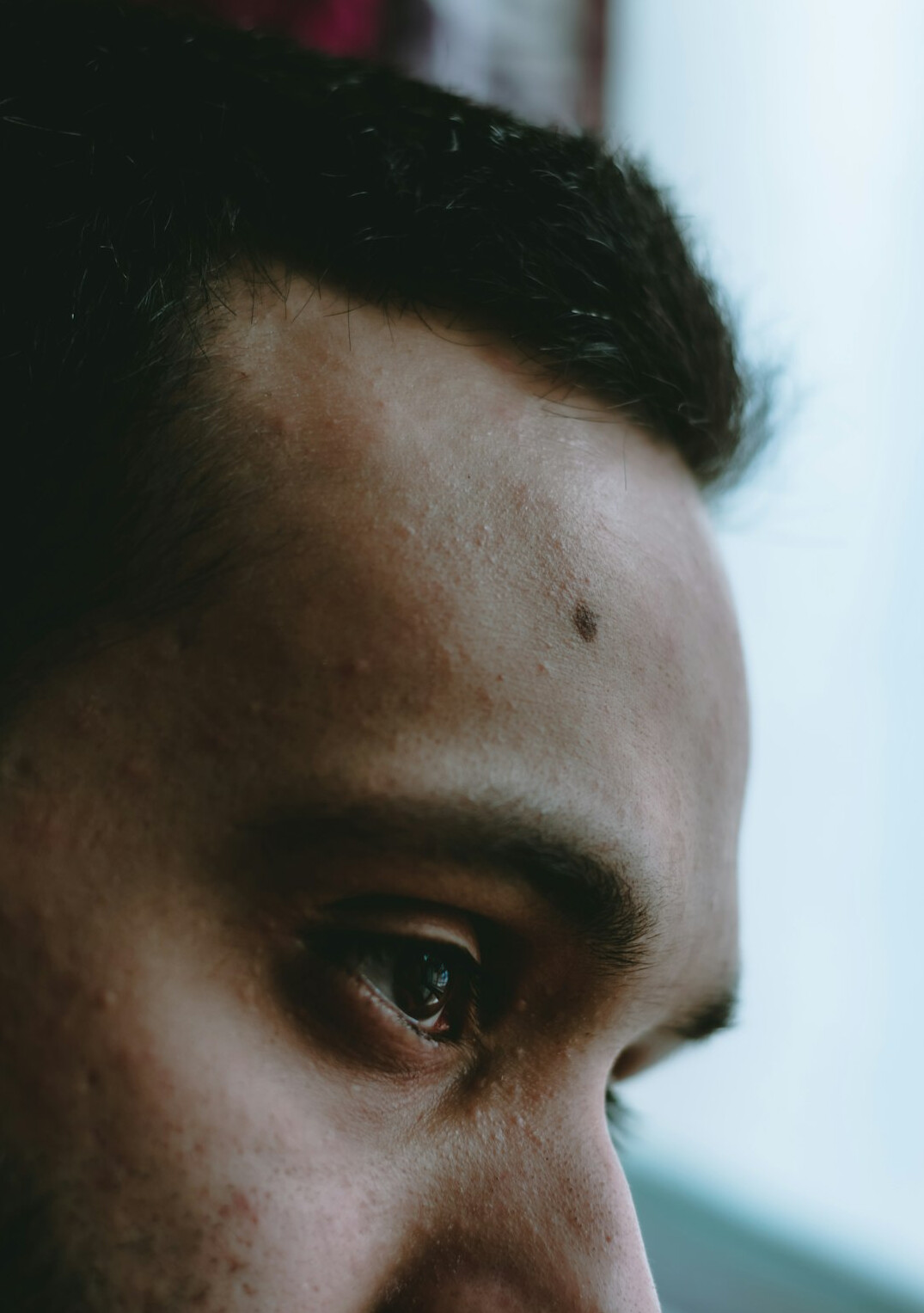Portrait of a man with short hair