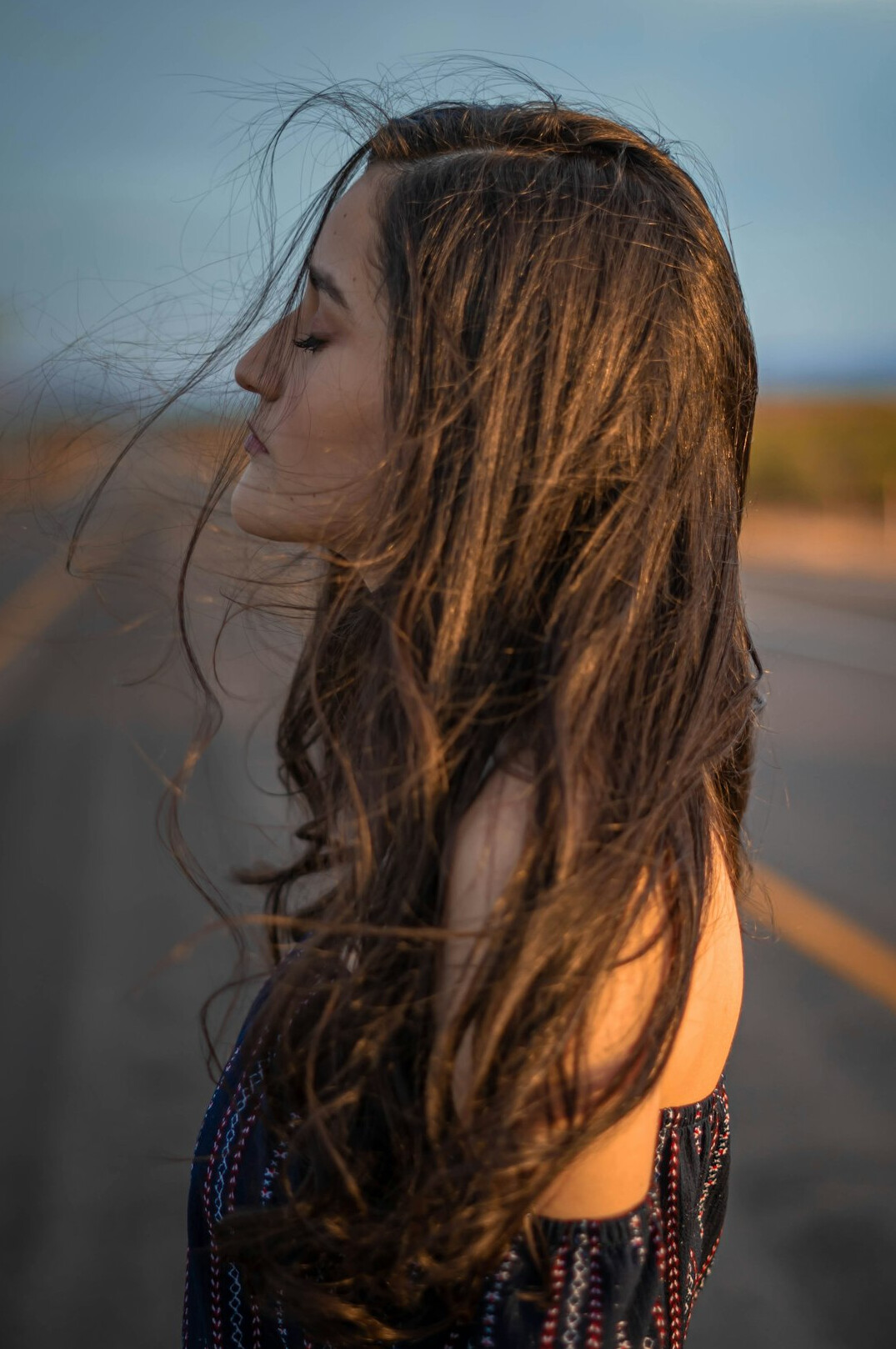 Portrait of a young woman with long hair
